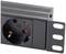 Close-up of a black electronic device with a power socket, mounted in a metal frame.