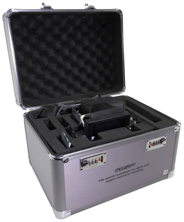Silver transport case with an open lid, showing technical equipment safely embedded in foam. Inscription: 'The world's leading mobile and speed control industry'.