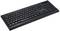 A black computer keyboard with a QWERTY layout, numeric keypad and function key row. Suitable for office and home applications.