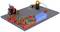 A construction workshop with electronic components, gears, and coloured cables on a grey base plate.