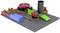 A model kit on a perforated board displays various coloured components and wiring that simulate a machine.