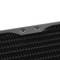 Close-up of a black, structured plastic material with straight lines and regular indentations.