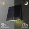 The image depicts a solar light that charges in 5 hours and illuminates for 17 hours, with symbols representing day and night.
