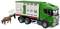 A green toy lorry with a livestock trailer, from which a brown cow is being led.