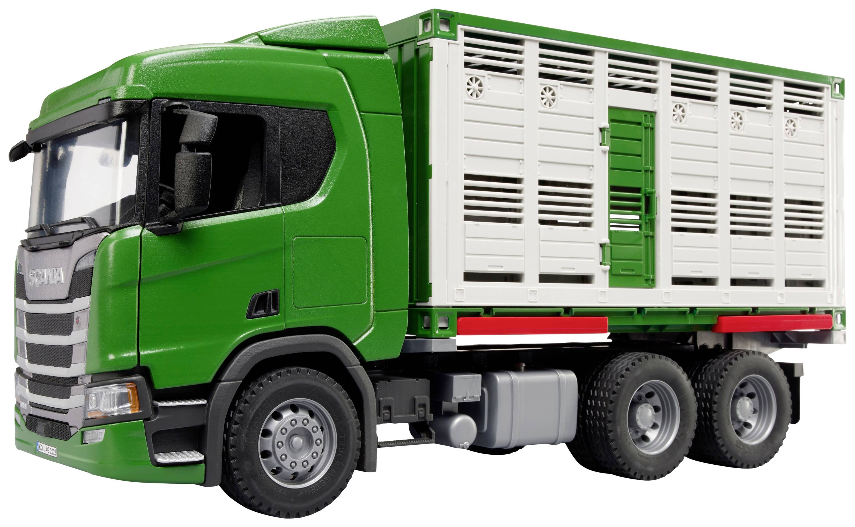 A green lorry with a white, ventilated trailer, suitable for transporting animals or ventilated cargo.