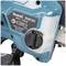Close-up of a blue electric tool with the inscription 'Makita DUC101 18V 8.0 m/s 100 mm'.