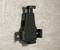 Wall mount made of black plastic, suitable for tablets or smartphones, mounted on a concrete wall.