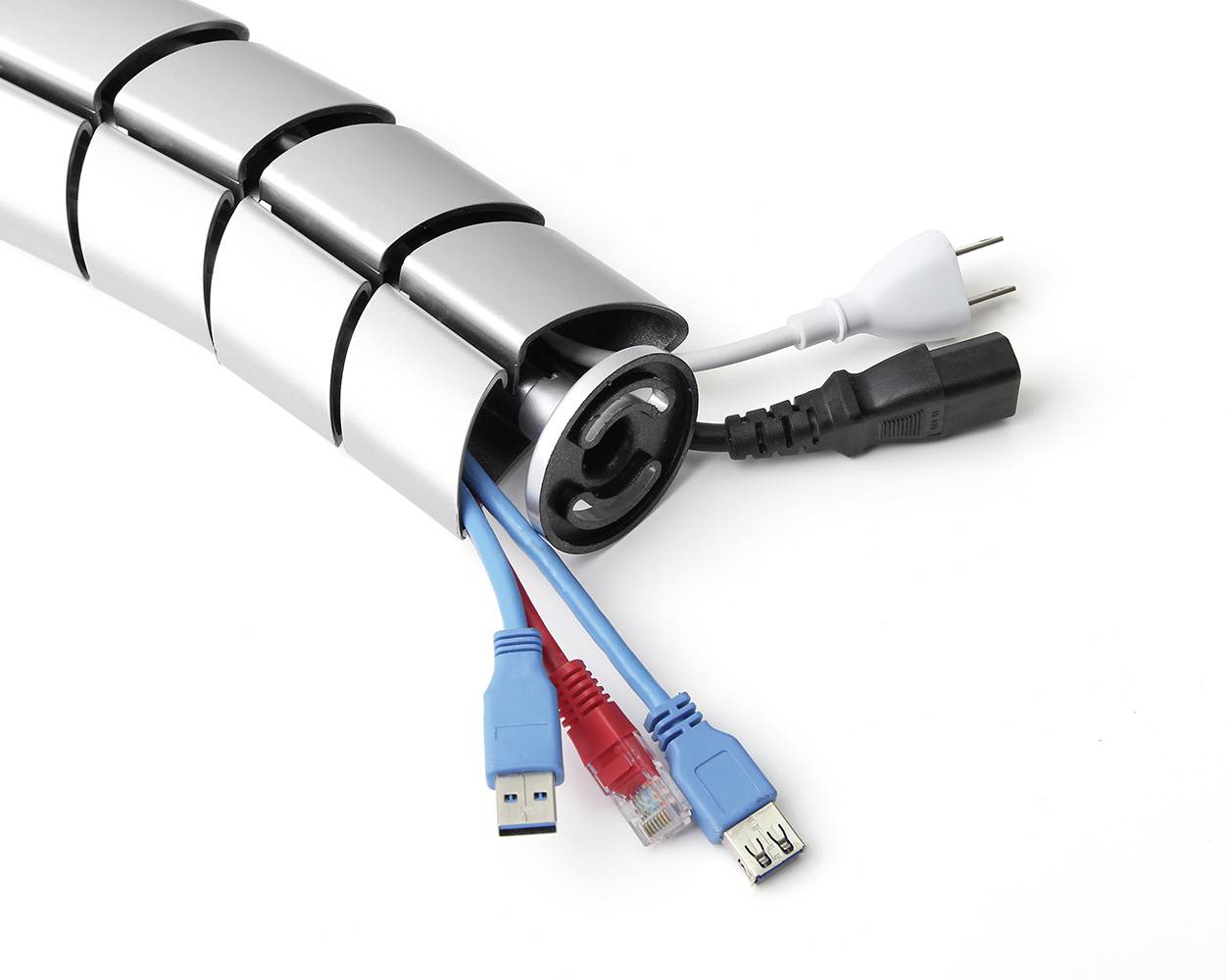 A cable trunking system contains various cables, including USB and Ethernet cables as well as a power plug, and ensures tidiness.