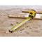 A yellow tape measure lies on a dusty floor next to pieces of wood, symbolising craftwork or building projects.