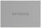 'Netgear' logo on a grey background, possibly on a device or packaging.