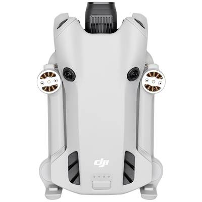 Drone view from above, showing the upper cover with "DJI" logo and both motors.