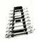 'A set of spanners in various sizes, arranged in a black holder, against a white background.'