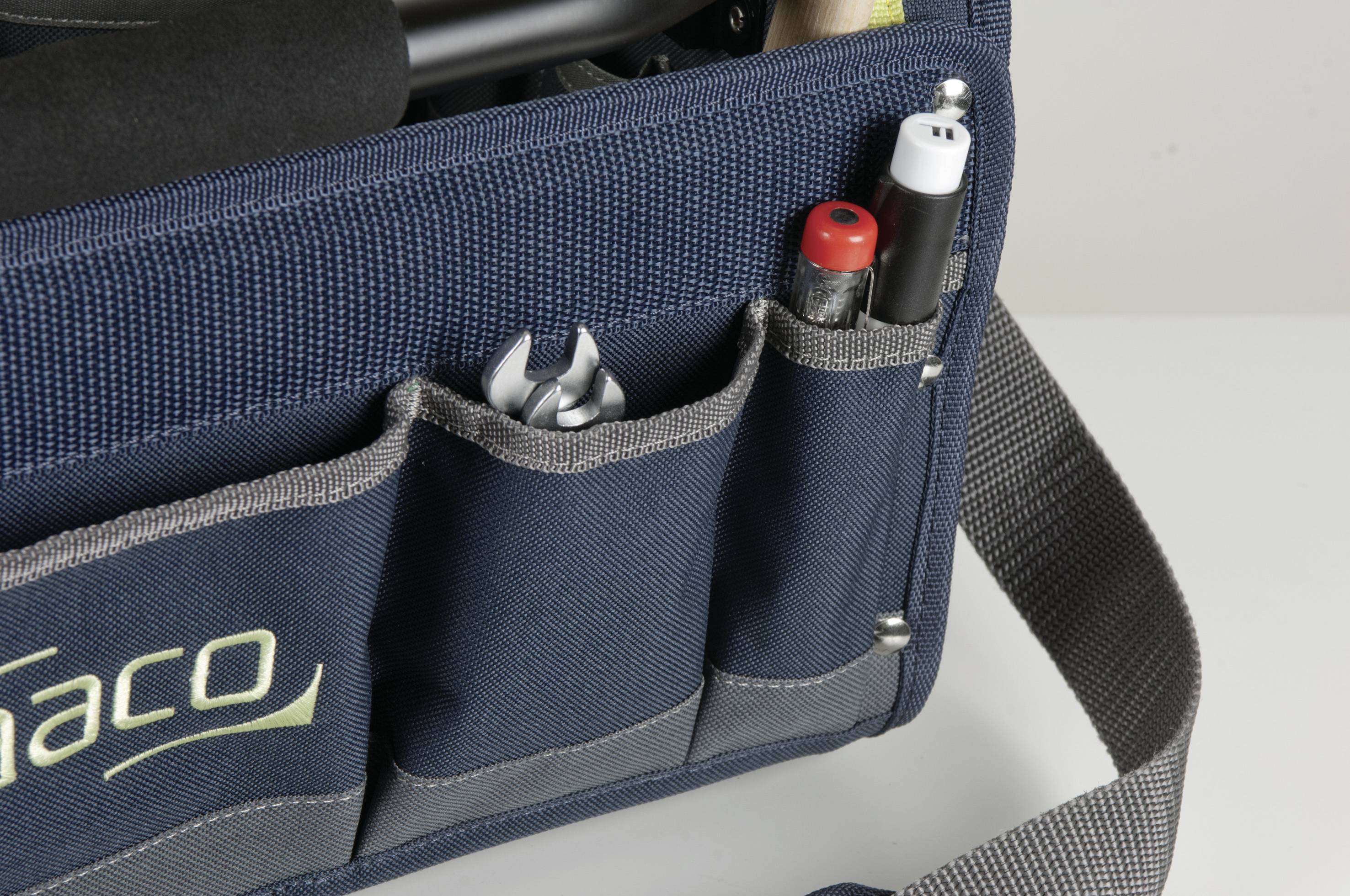 Dark blue tool bag with multiple small external pockets, containing a spanner and two pens.