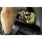 A person wearing black and yellow striped gloves is repairing a car with a spanner under the bonnet.