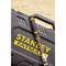 A Stanley FatMax chisel is lying on a black tool case with the yellow Stanley FatMax logo.