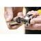 Two hands demonstrate the operation of a mechanical device that looks similar to a door lock, potentially for a security application.