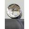 'Close-up of a gleaming socket spanner viewed from above, with a clearly visible hexagonal opening'