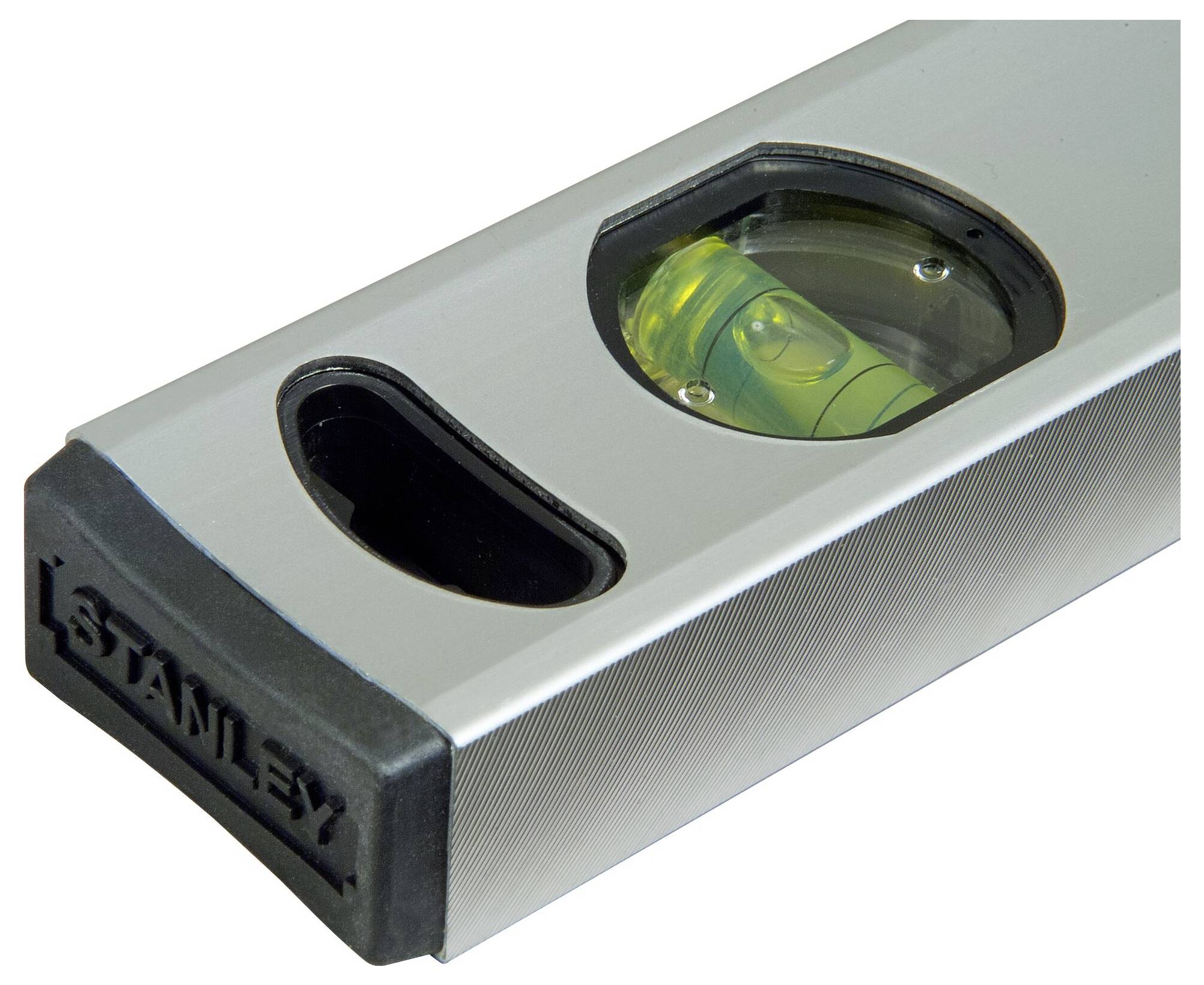 Spirit level in close-up showing the bubble vial that indicates the water level is balanced. Tool for levelling surfaces.