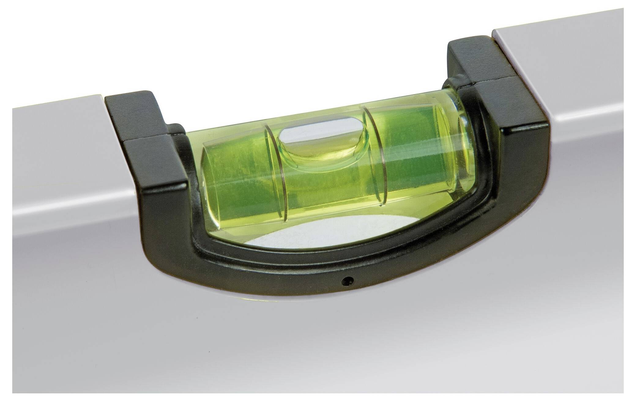 Close-up of a spirit level's bubble vial, showing that the surface is level as the air bubble is centred in the tube.