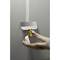 A person is applying filler to a plasterboard wall using a plastering trowel and joint tape.