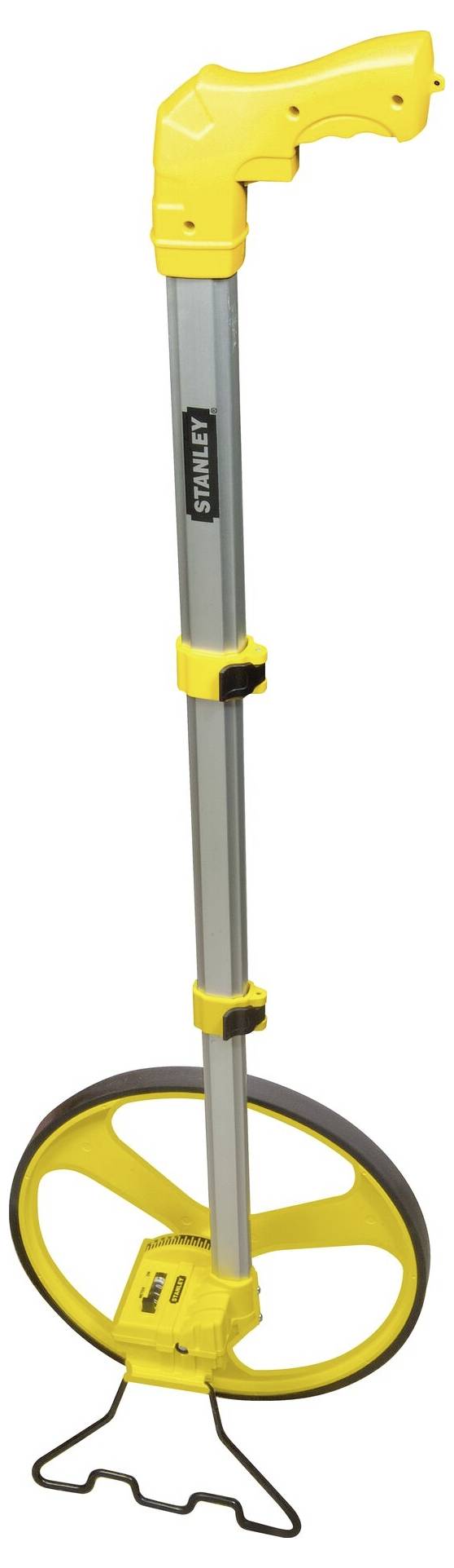 Stanley measuring wheel with yellow handle and wheel, used for measuring distances on construction sites or in surveying.