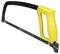 Yellow hacksaw with black saw blade, suitable for metal cutting. Ergonomic handle, used in workshop environments.