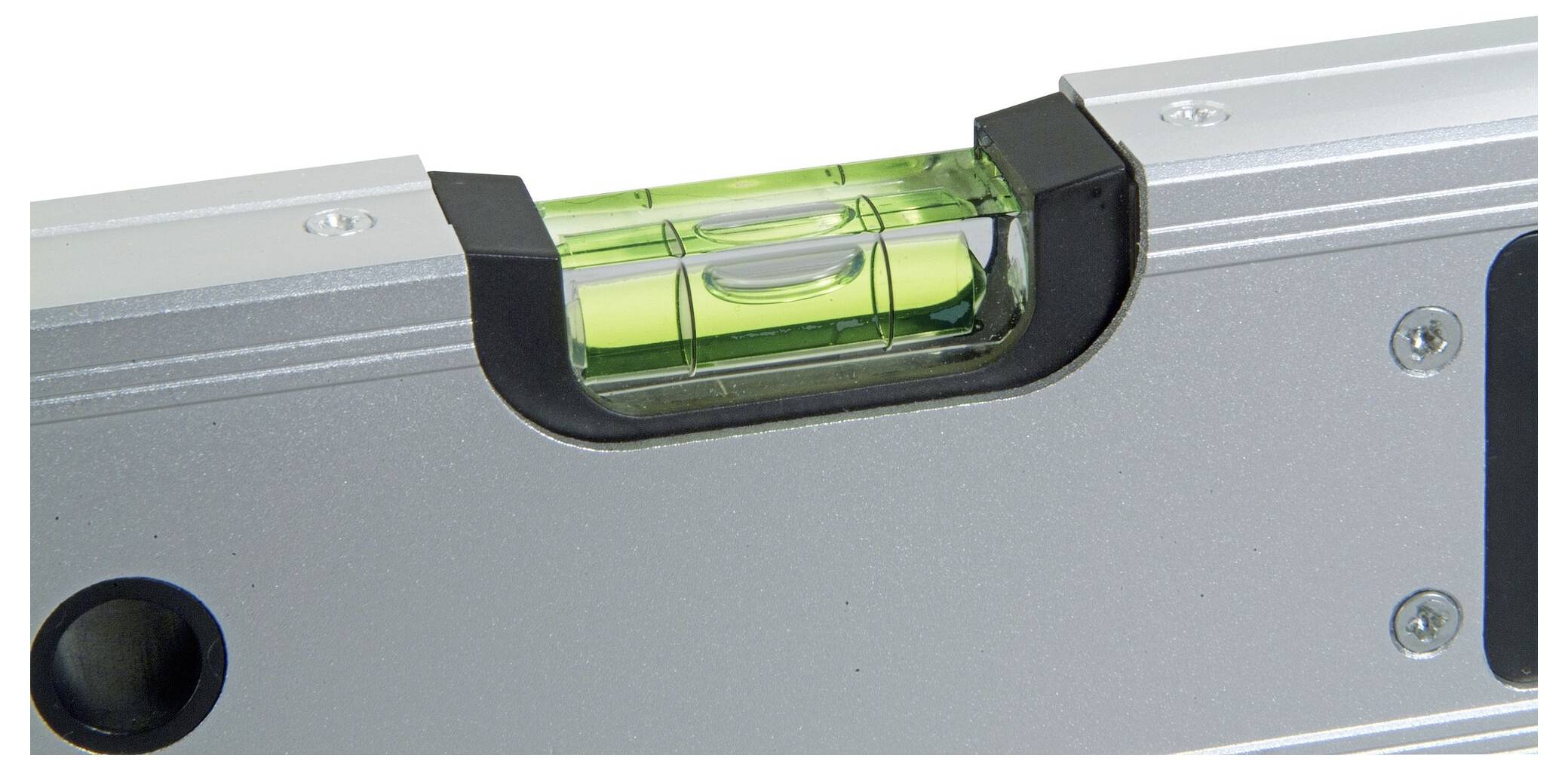 Spirit level shows that the surface is horizontal. The air bubble is positioned centrally between the markings.