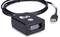 Black USB barcode scanner with long cable and green illuminated indicator. 'Quo' brand visible on the top surface.