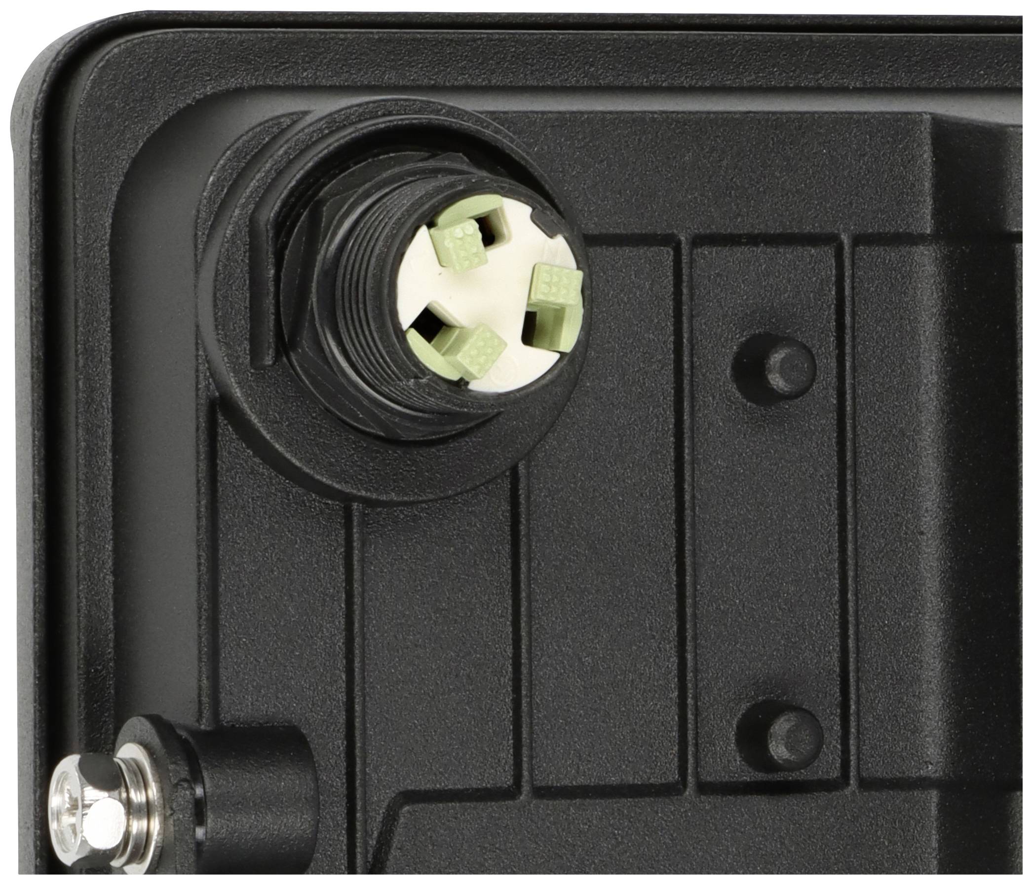 Close-up of a connector with multiple green pins in a housing, potentially part of an electronic device.