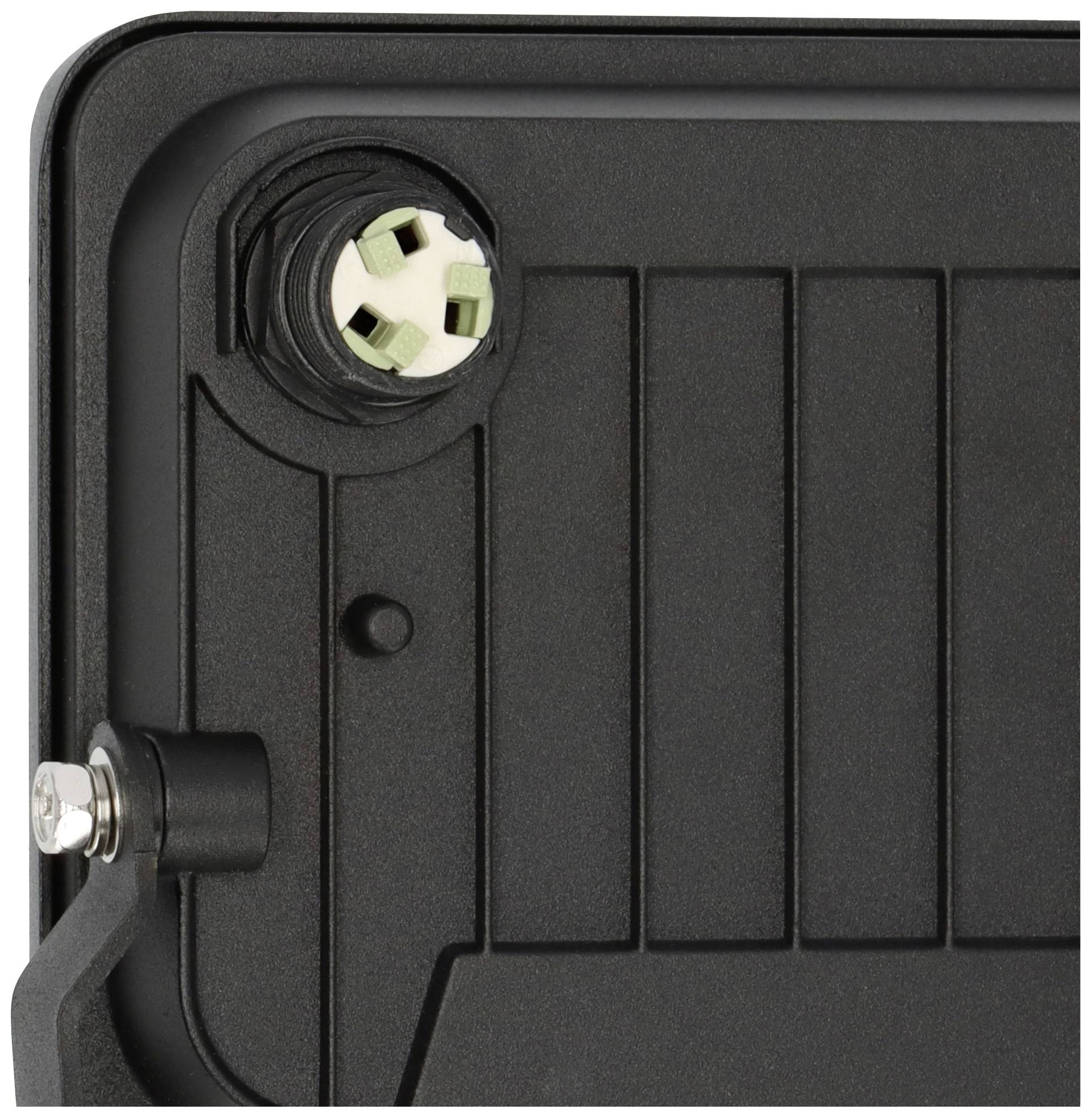 Corner of a black housing with a metal hinge and a round, green-white connector.