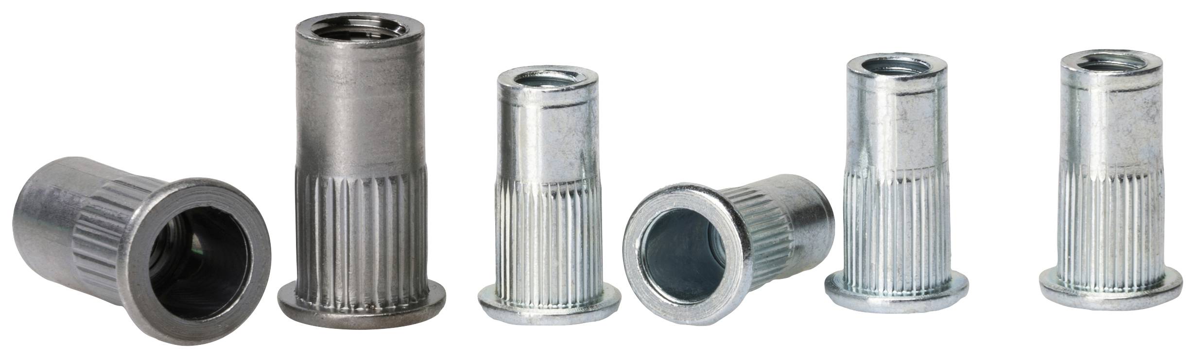 Six knurled threaded sleeves in a row, varying in size and colour, demonstrate a comparison of different metal components.