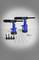 Two blue pneumatic rivet guns on a table, surrounded by various tool attachments, rivet rods and spare parts.