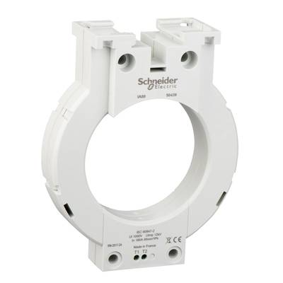 White electric transformer from Schneider Electric, circular design, with product information printed on it.