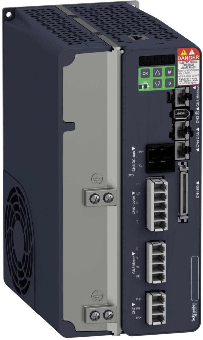 A black, wall-mounted electronic device with multiple ports and indicator lights. A warning sign is positioned in the top right corner.