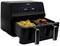 Double deep fryer with two compartments, left for chips, right for chicken legs, digital temperature display, both at 200 degrees.