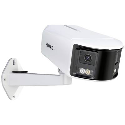 Camera mounted on wall bracket, facing right. White casing, two LEDs beside the lens. Used for surveillance.