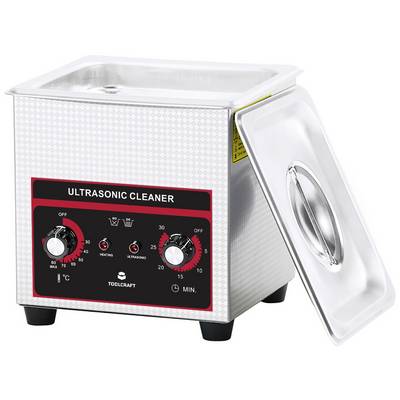An ultrasonic cleaner with an open lid, control knobs for time and temperature settings. Brand name and control elements visible.