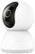White spherical surveillance camera with black lens area mounted on a circular base.