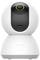 A smart, white security camera with a rounded design and lens in the upper area. Suitable for home surveillance.