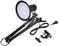 Black desk lamp with adjustable arm, round lampshade and clamp for attaching to the table.