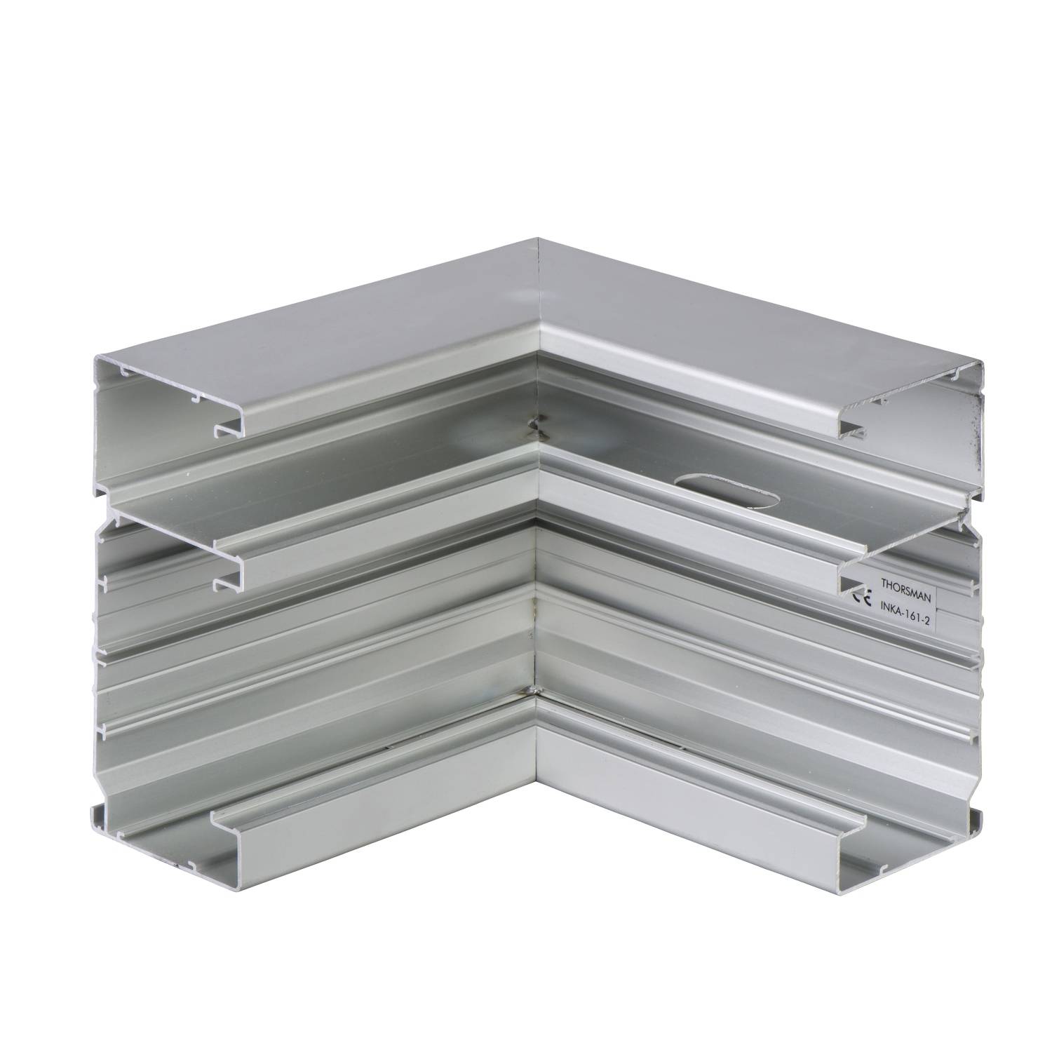 Metallic corner connector piece that joins two rectangular ducts at a 90-degree angle. Silver surface, industrial design.
