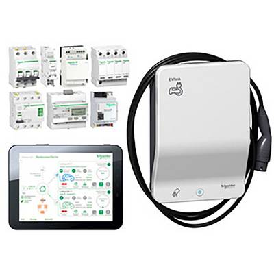 Tablet displays energy management software next to an electric vehicle charging station and various electrical components.