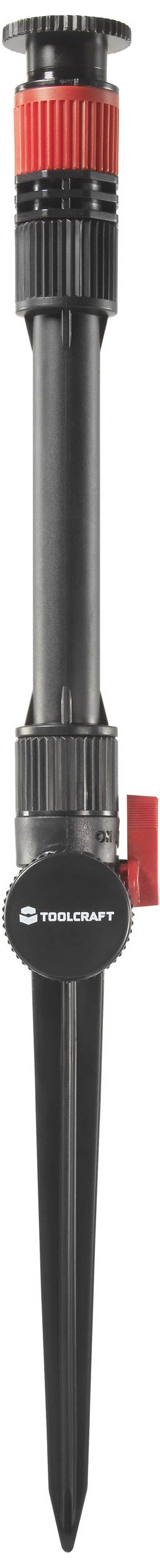 A black garden sprinkler with a red control dial on top, standing upright for watering plants.