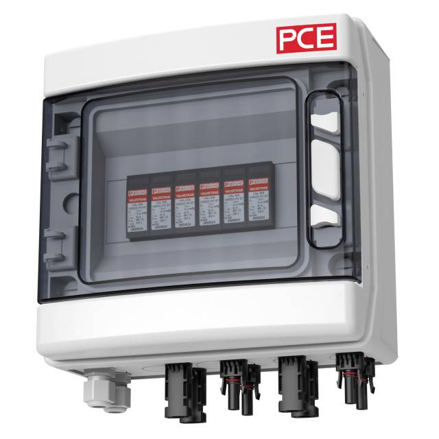 'PCE' label on an electrical distribution box with a transparent cover, with several black cable connections visible underneath.