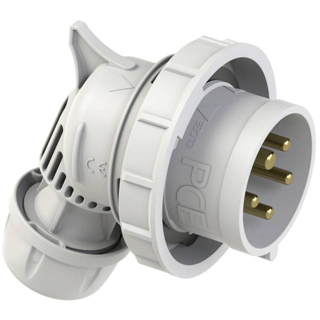 A grey, moulded plug with three brass pins.
