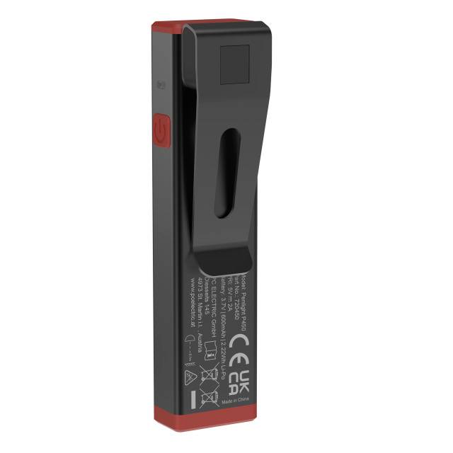 A small, black electronic device with a red-trimmed edge, a clip on the back, and CE marking.