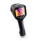 A black thermal imaging camera with a display showing a coloured thermal image of a building.