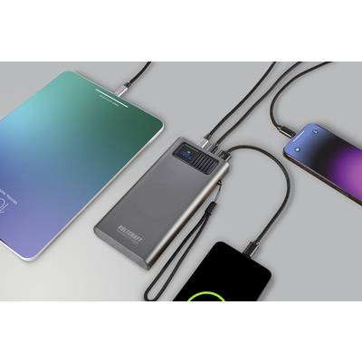 Several electronic devices, including a tablet and smartphones, are connected to a power bank, charging the devices.
