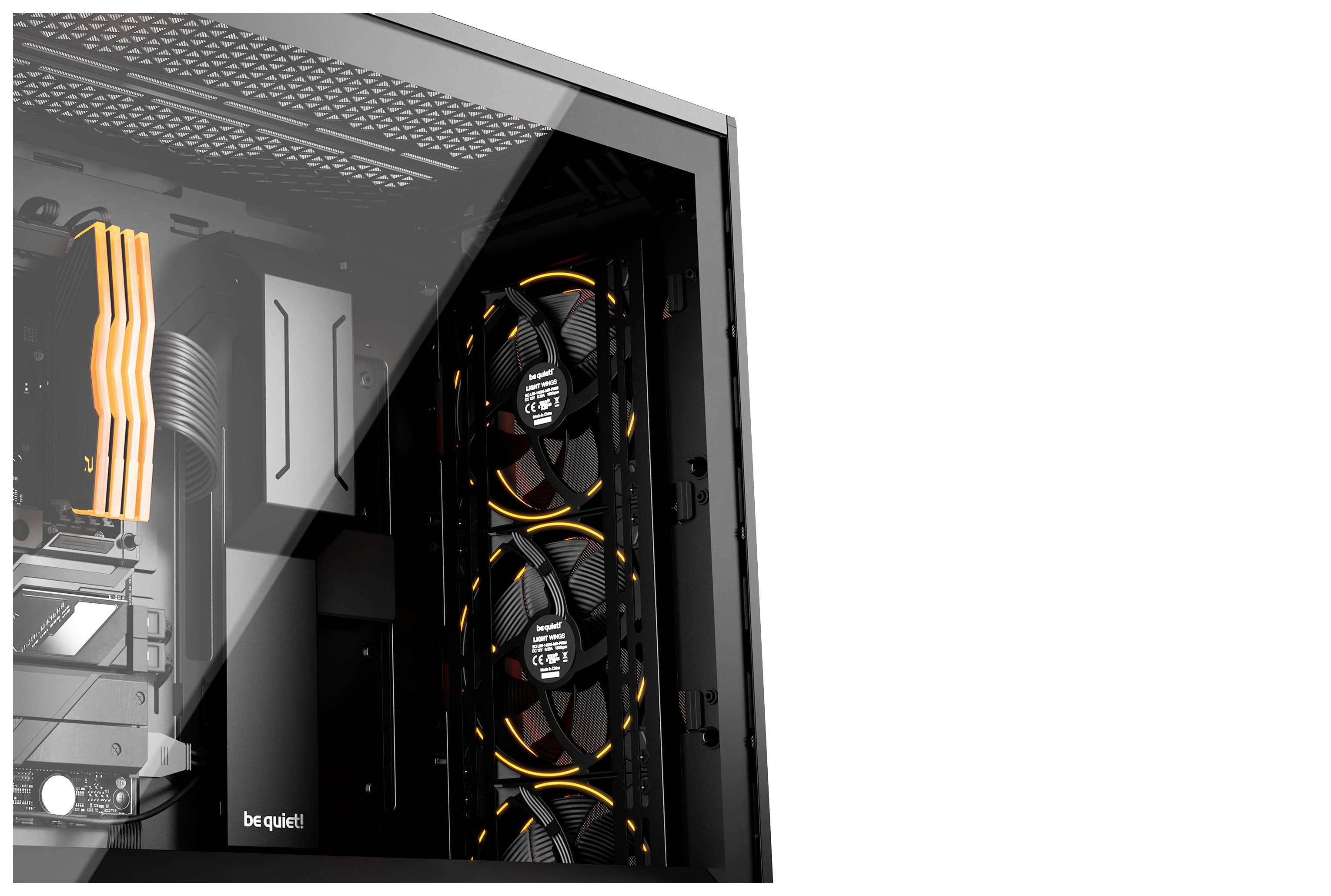 Open computer with multiple illuminated fans inside against a white background.