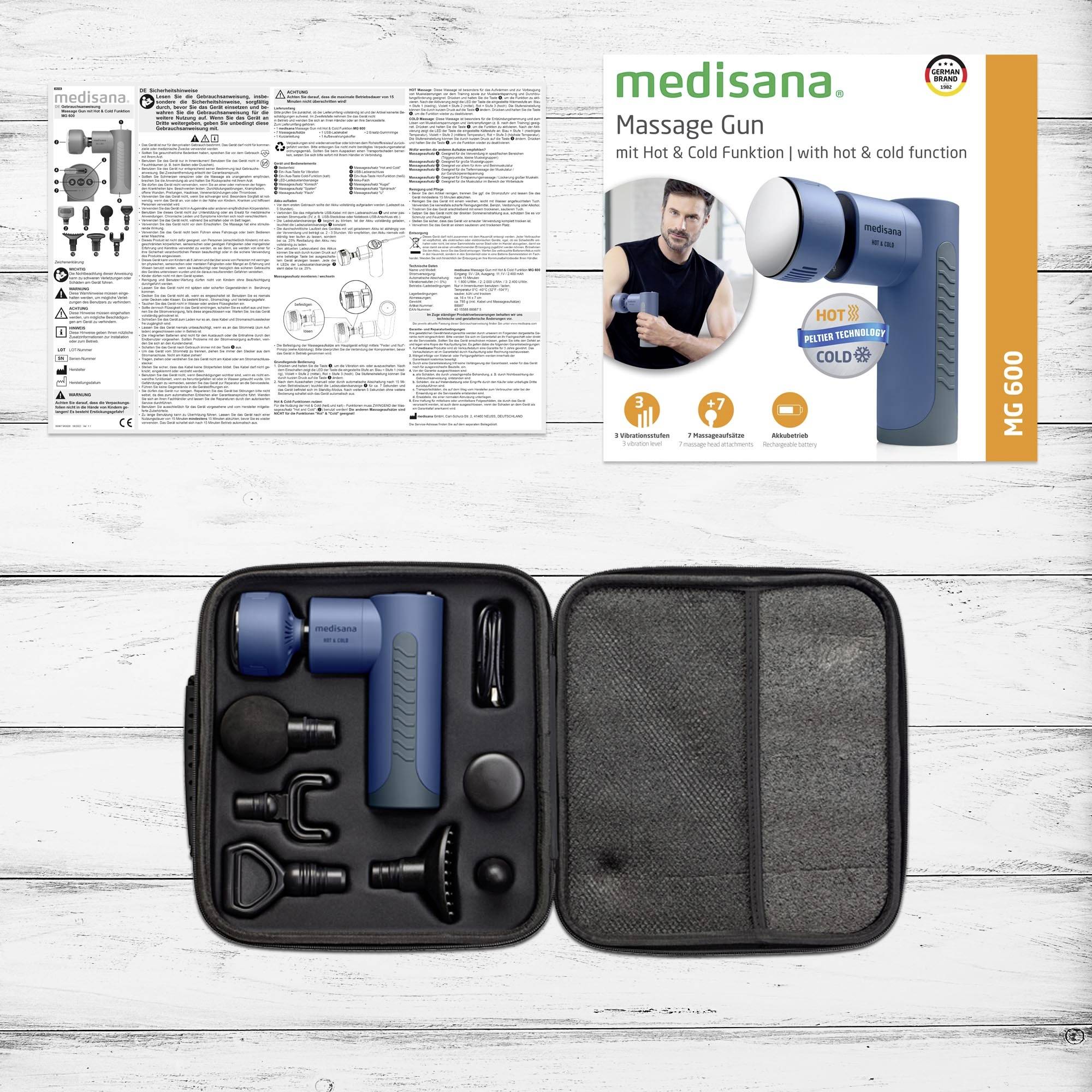 Medisana MC 600 Massage Device with Hot and Cold Function in Blue, Shown with Accessories and Case. Packaging and Instructions are Also Visible.